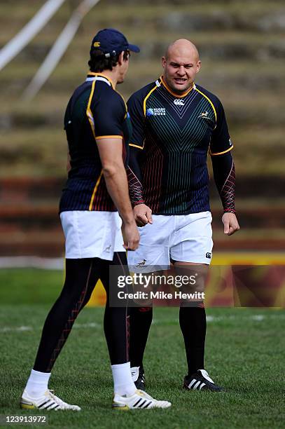 Sprinbok prop CJ van der Linde speaks with centre Jaque Fourie during a South Africa IRB Rugby World Cup 2011 training session at Rugby League Park...
