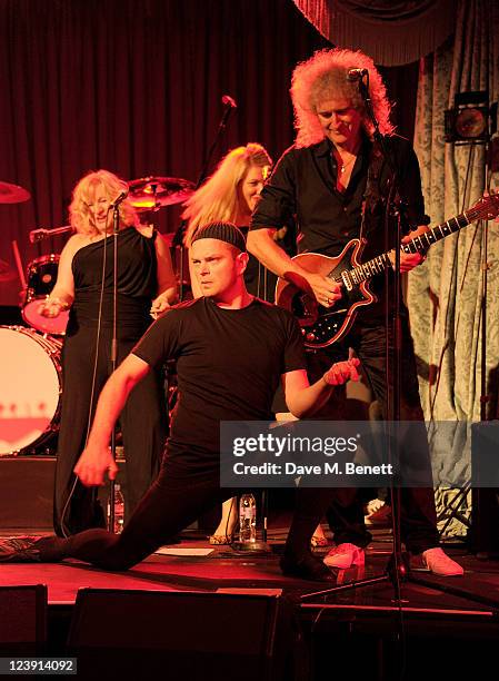 David Armand and Brian May attend "Freddie For A Day", celebrating Freddie Mercury's 65th birthday, in aid of The Mercury Pheonix Trust at The Savoy...