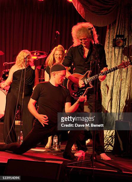 David Armand and Brian May attend "Freddie For A Day", celebrating Freddie Mercury's 65th birthday, in aid of The Mercury Pheonix Trust at The Savoy...