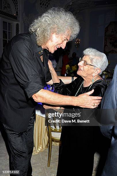 Brian May and Freddie Mercury's mother Jer Bulsara attend "Freddie For A Day", celebrating Freddie Mercury's 65th birthday, in aid of The Mercury...