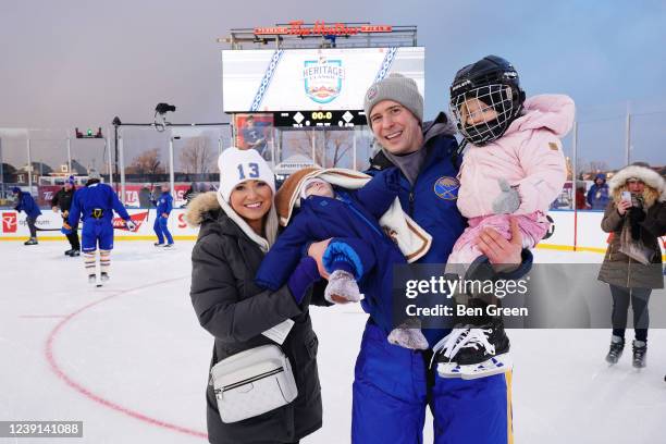 Mark Pysyk of the Buffalo Sabres poses with guests at practice for the 2022 Tim Hortons NHL Heritage Classic at Tim Hortons Field against the Toronto...