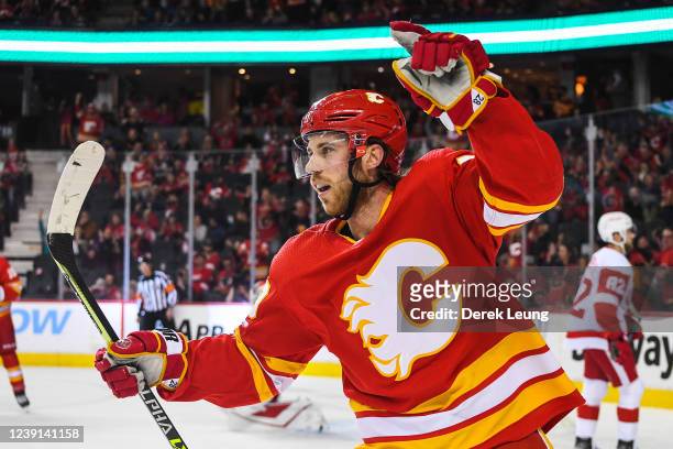Elias Lindholm of the Calgary Flames celebrates after scoring against the Detroit Red Wings during an NHL game at Scotiabank Saddledome on March 12,...