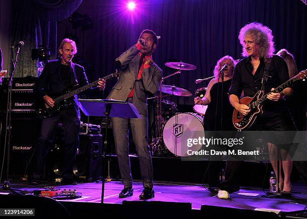 Mike Rutherford, Ty Taylor and Brian May perform at "Freddie For A Day", celebrating Freddie Mercury's 65th birthday, in aid of The Mercury Pheonix...