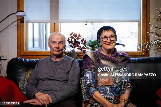 Seppo Laaksovirta and his wife Maija Poyhia pose for a picture in their home in Lappeenranta, Finland, on March 9, 2022. - In Finland, Russia's...