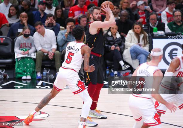 Chicago Bulls forward Derrick Jones Jr. Posts up against Cleveland Cavaliers forward Kevin Love during a NBA game between the Cleveland Cavaliers and...