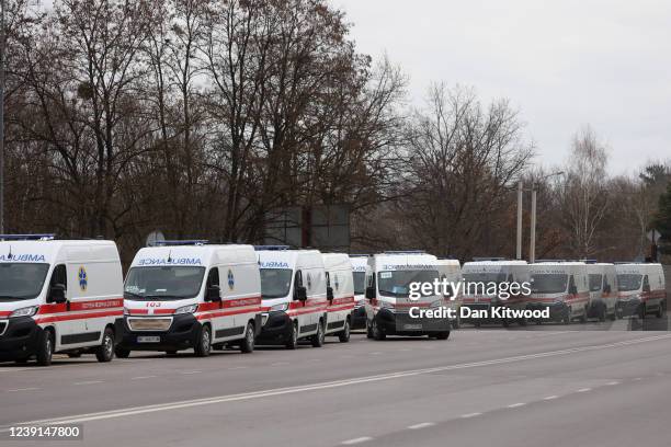 Ambulances are seen traveling to and from the Yavoriv military facility on March 13, 2022 in Novoiavorivsk, Ukraine. Early this morning, a series of...