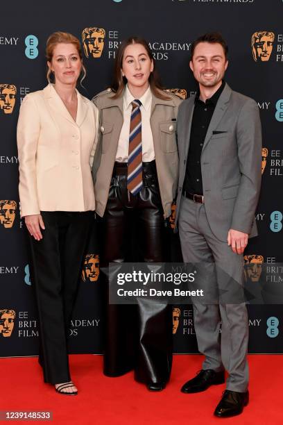 Producer Sara Murphy, Este Haim and Andy Jurgensen attend the EE British Academy Film Awards 2022 Nominees' Reception at BAFTA on March 12, 2022 in...
