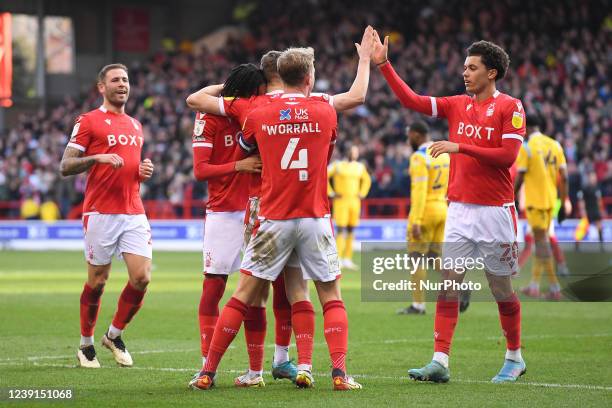 The Reds celebrate after Ryan Yates of Nottingham Forest scored a goal to make init 3-0 during the Sky Bet Championship match between Nottingham...