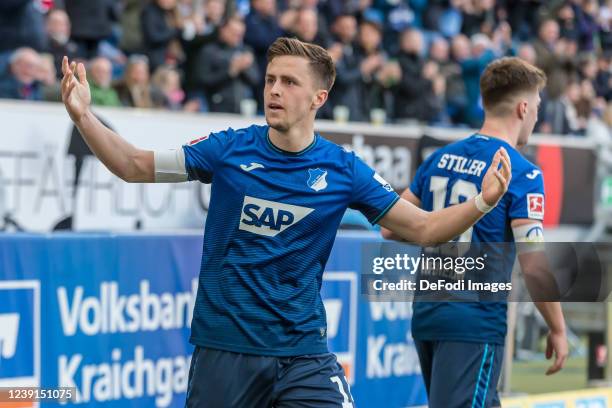 Christoph Baumgartner of TSG 1899 Hoffenheim celebrates after scoring his team's first goal during the Bundesliga match between TSG Hoffenheim and FC...