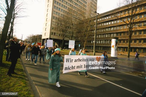 More than a thousand anti vaccine mandate people protest against vaccine mandator in Duesseldorf, Germany on March 12, 2022