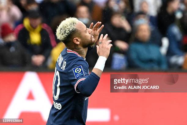 Paris Saint-Germain's Brazilian forward Neymar celebrates scoring his team's second goal during the French L1 football match between Paris-Saint...