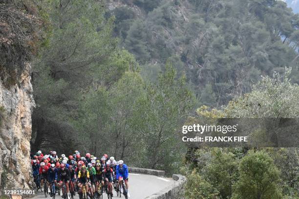 The pack rides during the 8th stage of the 80th Paris - Nice cycling race, 116 km between Nice and Nice, on March 13, 2022.