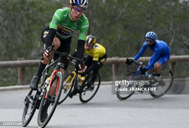 Jumbo-Visma's Belgian rider and best sprinter's green jersey Wout Van Aert and Jumbo-Visma's Slovenian rider and overall leader's yellow jersey...