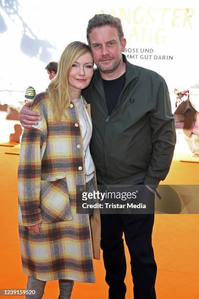Sebastian Bezzel and his wife Johanna Christine Gehlen attend the "Die Gangster Gang" premiere at UCI Luxe Mercedes Platz on March 13, 2022 in...