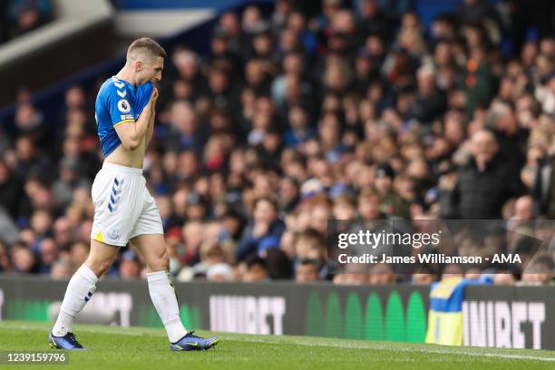 Jonjoe Kenny of Everton leaves the field after being shown a red card during the Premier League match between Everton and Wolverhampton Wanderers at...