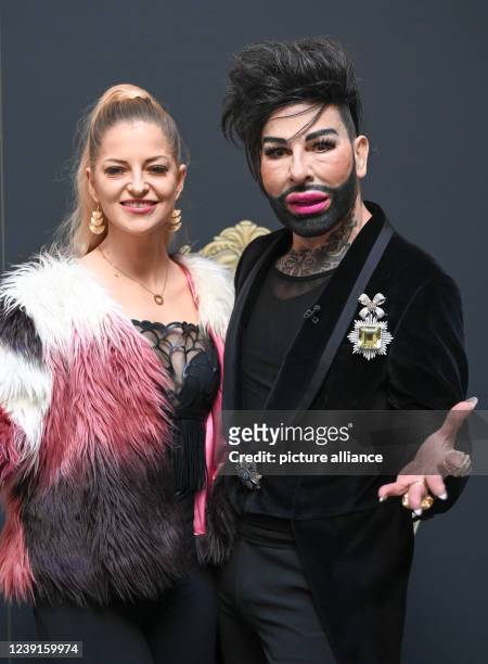 March 2022, Berlin: Fashion designer Harald Glööckler and Xenia Princess of Saxony show off at the presentation of the lifestyle collection "Teuber...