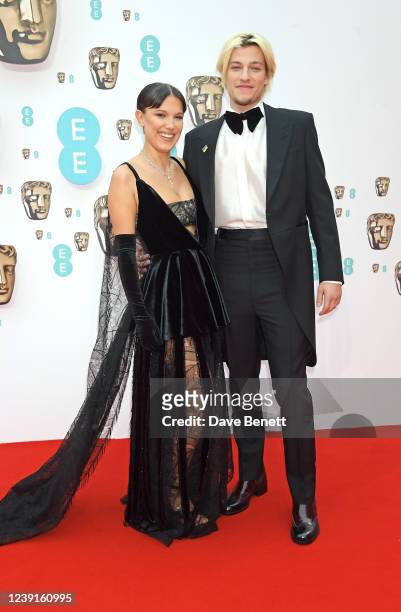 Millie Bobby Brown and Jake Bongiovi attend the EE British Academy Film Awards 2022 at Royal Albert Hall on March 13, 2022 in London, England.