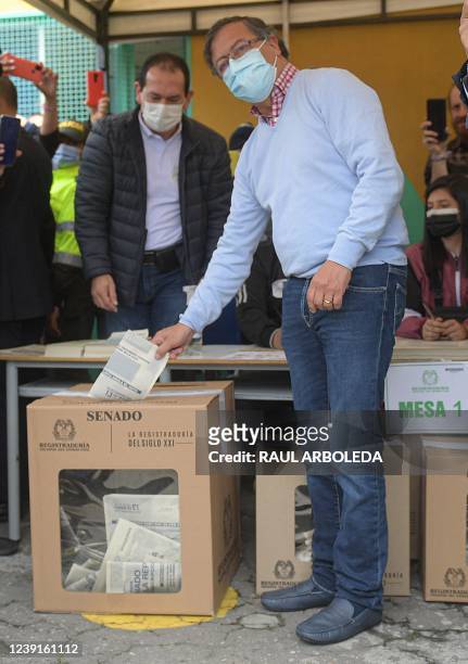 Colombian presidential pre-candidate for the 'Colombia Humana' political party and Historic Pact Coalition, Gustavo Petro, casts his vote at a...