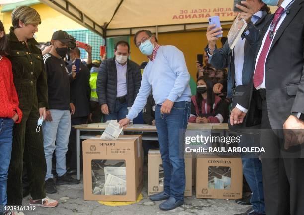 Colombian presidential pre-candidate for the 'Colombia Humana' political party and Historic Pact Coalition, Gustavo Petro, casts his vote at a...