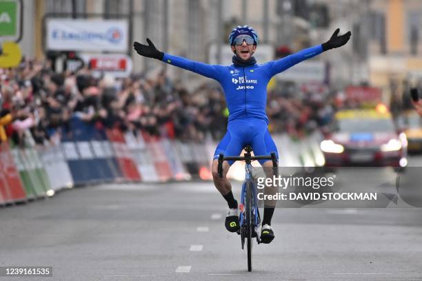 Britain's Simon Yates of BikeExchange-Jayco celebrates as he crosses the finish line of stage eight, the final stage of the 80th edition of the...