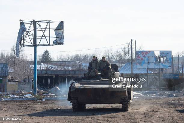 Members of Pro-Russian separatists are seen in a tank as Russian-Ukrainian conflict continues in the city of Volnovakha, Donetsk Oblast, Ukraine on...