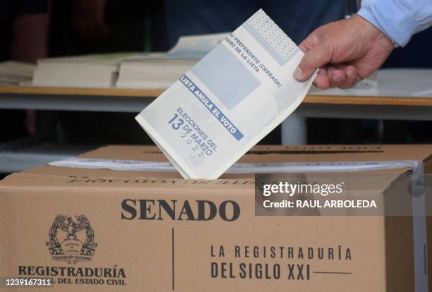 Colombian presidential pre-candidate for the 'Colombia Humana' political party and Historic Pact Coalition, Gustavo Petro, casts his vote during...