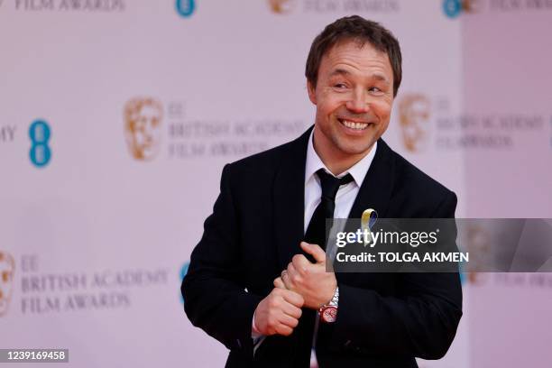 British actor Stephen Graham poses on the red carpet upon arrival at the BAFTA British Academy Film Awards at the Royal Albert Hall, in London, on...