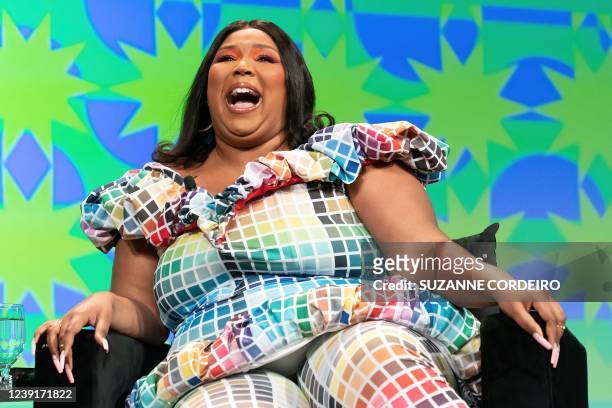 Grammy-winning singer, rapper, songwriter and flutist Lizzo appears on stage during the keynote session 'Lizzo' at the 2022 SXSW Conference and...