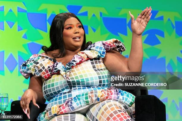 Grammy-winning singer, rapper, songwriter and flutist Lizzo appears on stage during the keynote session 'Lizzo' at the 2022 SXSW Conference and...