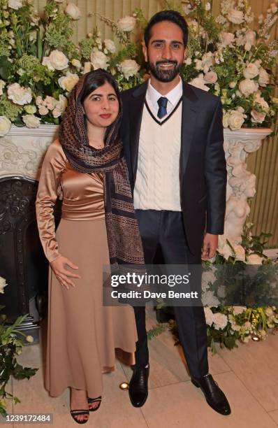 Malala Yousafzai and Asser Malik attend the British Vogue and Tiffany & Co. Fashion and Film Party 2022 at Annabel's on March 13, 2022 in London,...