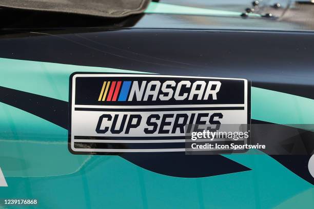 The NASCAR cup series logo on the car of Kurt Busch, driver of the 23XI Racing MoneyLion Toyota Camry, before the NASCAR Cup Series Ruoff Mortgage...