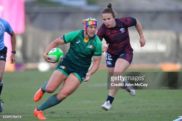 Sharni Williams of the Australia Women's Sevens gets past Kristi Kirshe of USA Women's Sevens at Los Angeles Coliseum on March 13, 2022 in Los...