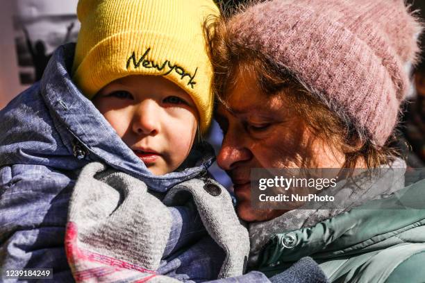 Ukrainian citizens and supporters attend a demonstration of solidarity with Ukraine demanding NATO to close the sky for Russian planes over the...