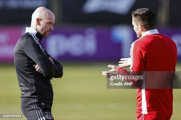 Ajax coach Erik ten Hag, Dusan Tadic of Ajax during a training session prior to the Champions League match against Benfica at Sportcomplex De...
