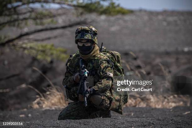 Japan Ground Self-Defense Force soldier from the 1st Amphibious Rapid Deployment Brigade takes part in a training exercise with the United States...