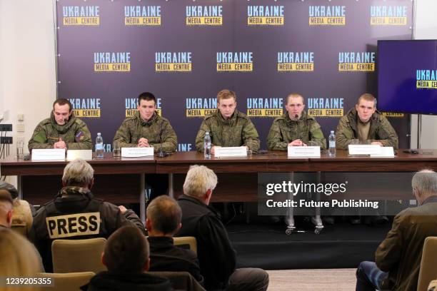 Captive Russian conscripts Nikolai Polshchikov, Niyaz Akhunov, Aleksandr Morozov, Anton Savin and Andrey Pozdeev are pictured during a briefing at...