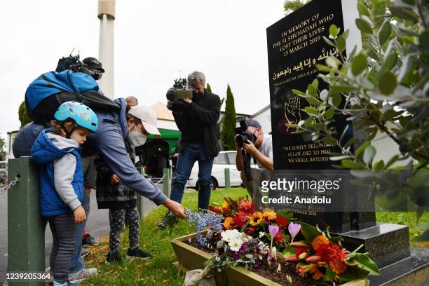 Member of the public places flowers infront of Masjid An-Nur mosque prior to Temel Atacocugu, a survivor of twin mosque attacks, arrivalÃ in...