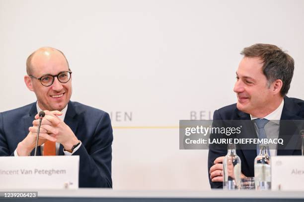 Belgium's Prime Minister Alexander De Croo and Finance Minister Vincent Van Peteghem address a press conference of the Federal Government regarding...