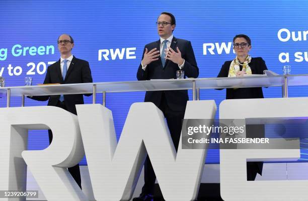 The CEO of German energy giant RWE Markus Krebber , RWE board member Zvezdana Seeger and CFO Michael Mueller address a press conference at the...