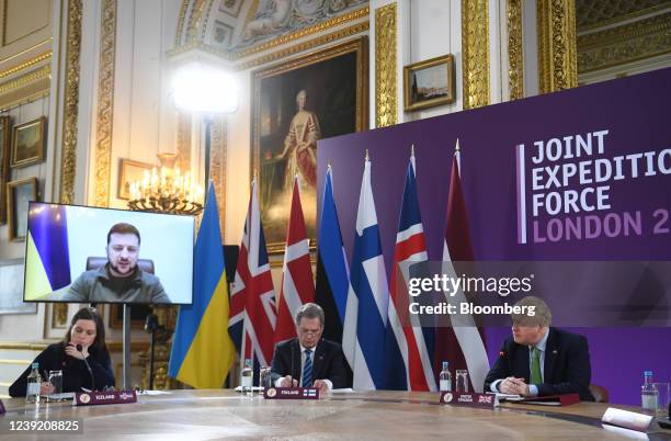 Volodymyr Zelenskiy, Ukraine's president, address, via video link, attendees, including Katrin Jakobsdottir, Iceland's prime minister, left, Sauli...