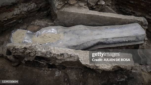 Picture shows a 14th century lead sarcophagus discovered in the floor of Notre Dame Cathedral, in Paris, on March 15, 2022.