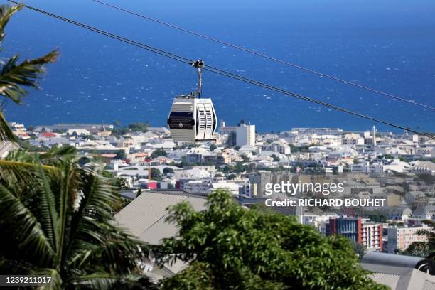 This photograph taken on March 15 shows a cabin of the first urban cable car on the Indian Ocean island of Reunion, on the day of its inauguration...