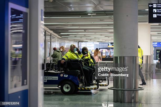 Ground crew staff at Frankfurt Airport in Frankfurt, Germany, on Tuesday, March 15, 2022. Hundreds of flights were canceled across Germany on March...