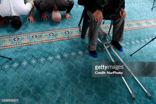 Members of the Mulim community pray at Masjid Un-Nur mosque in Christchurch, New Zealand on March 15, 2022. Temel Atacocugu finished 360 kilometre...