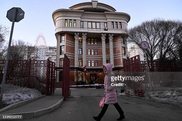Woman walks past the Ostankinsky District Court, where a hearing of the case of Marina Ovsyannikova - the editor at the state broadcaster Channel One...