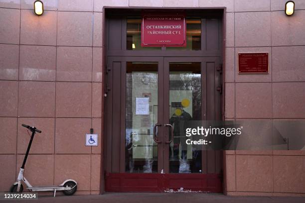An electric scooter is seen parked by the entrance to the Ostankinsky District Court, where a hearing of the case of Marina Ovsyannikova - the editor...