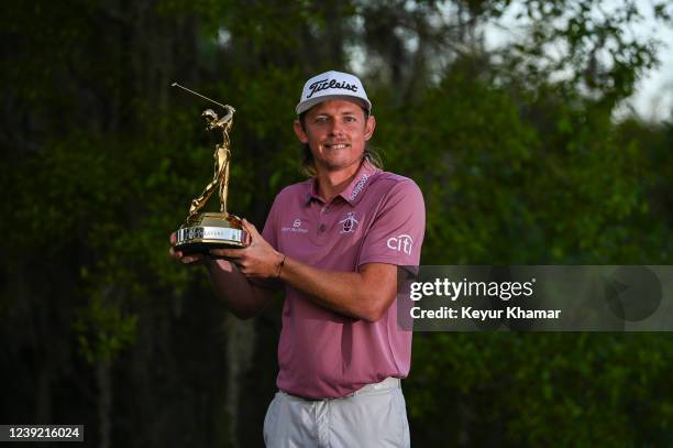 Cameron Smith of Australia smiles with the trophy following his one stroke victory during the final round of THE PLAYERS Championship on the Stadium...