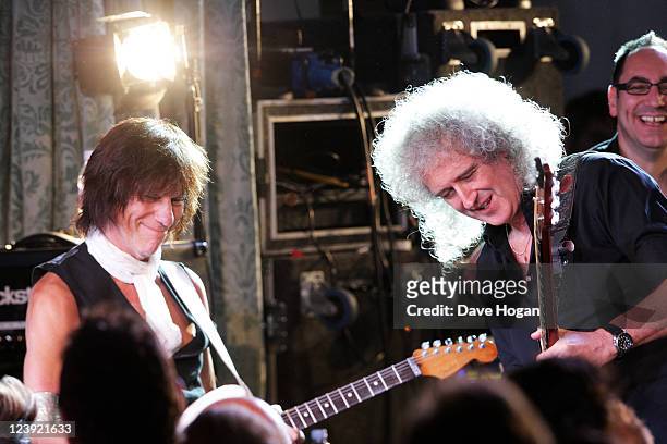 Jeff Beck and Brian May perform onstage at the Freddie For A Day 65th birthday anniversary party at The Savoy Hotel on September 5, 2011 in London,...