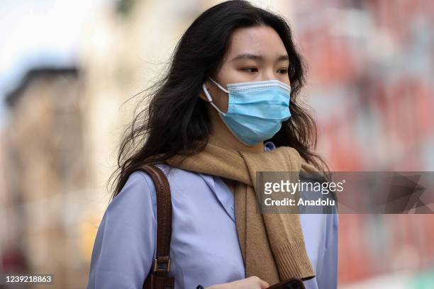 An Asian woman is seen in the Chinatown of New York City, United States on March 15, 2022. Anti-Asian hate is rising up in United States as late...