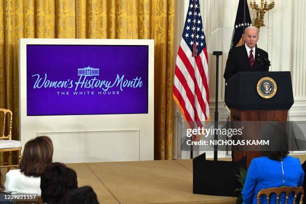 President Joe Biden speaks during the Equal Pay Day event to celebrate Womens History Month in the East Room of the White House in Washington, DC,...
